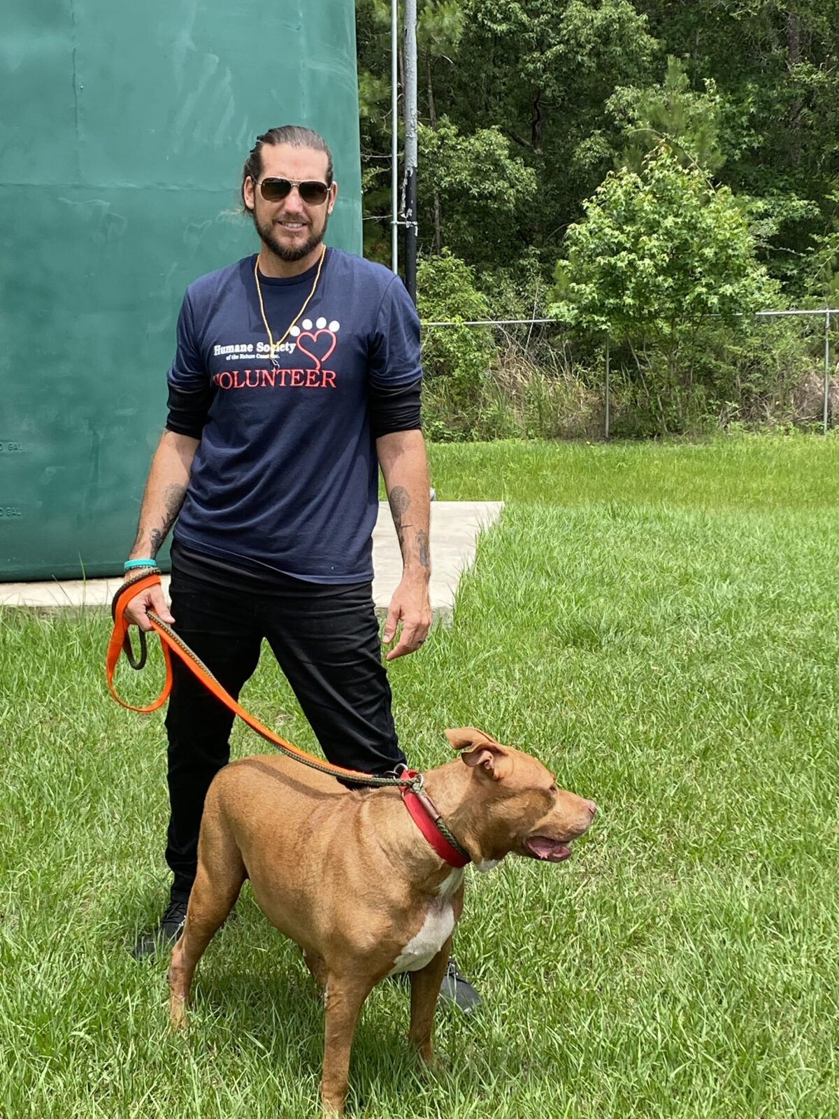 Volunteers like James Schmeda help the staff at the Humane Society of the Nature COast ensure that the animals in their care receive affection and exercise while waiting for their new forever homes. 
