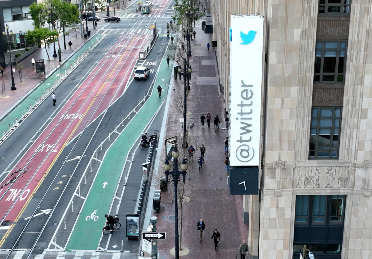 A sign is posted on the exterior of Twitter headquarters in San Francisco, on April 27, 2022. (Justin Sullivan/Getty Images)