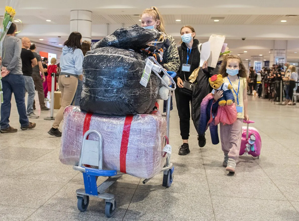Ukrainian nationals arrive at Trudeau Airport in Montreal, May 29, 2022. (The Canadian Press/Graham Hughes)