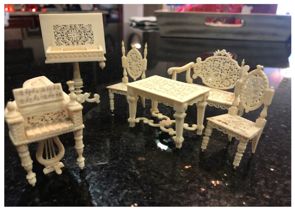 Beautiful but delicate, this dollhouse furniture was probably made in India. (Handout/TNS)