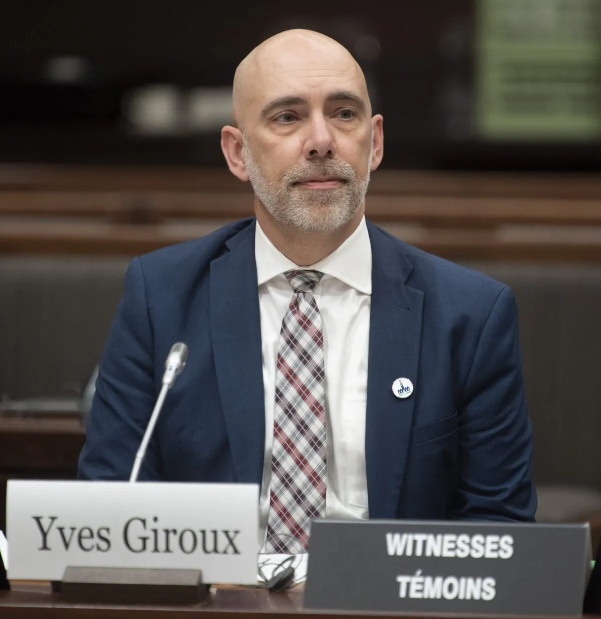 Parliamentary Budget Officer Yves Giroux waits to appear before the Commons Finance committee on Parliament Hill in Ottawa on March 10, 2020. (Adrian Wyld/The Canadian Press)