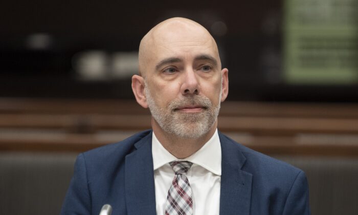 Parliamentary Budget Officer Yves Giroux waits to appear before the Commons finance committee on Parliament Hill in Ottawa on March 10, 2020. (Adrian Wyld/The Canadian Press)