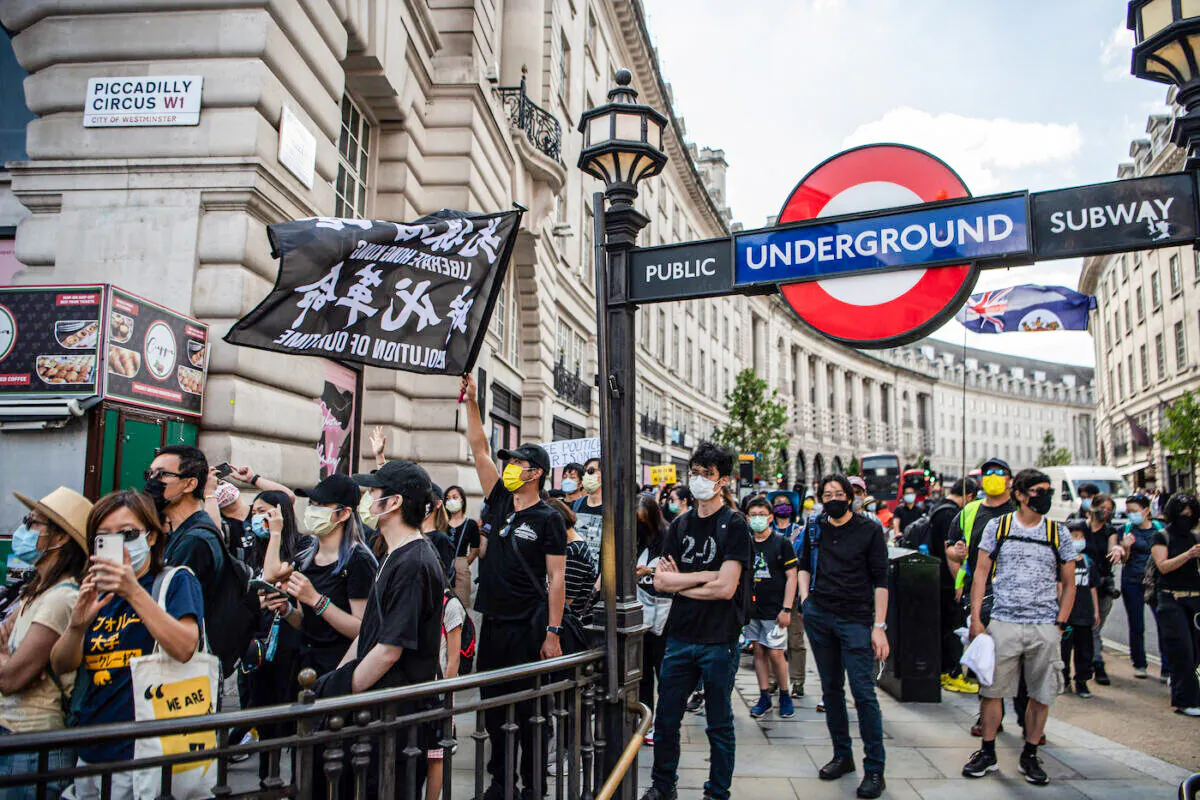 Protesters attend a rally for democracy in Hong Kong on June 12, 2021 in London, England. (Laurel Chor/Getty Images)