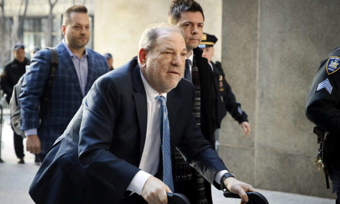 Harvey Weinstein arrives at a Manhattan courthouse as jury deliberations continue in his rape trial, in New York, on Feb. 24, 2020. (John Minchillo/AP Photo)