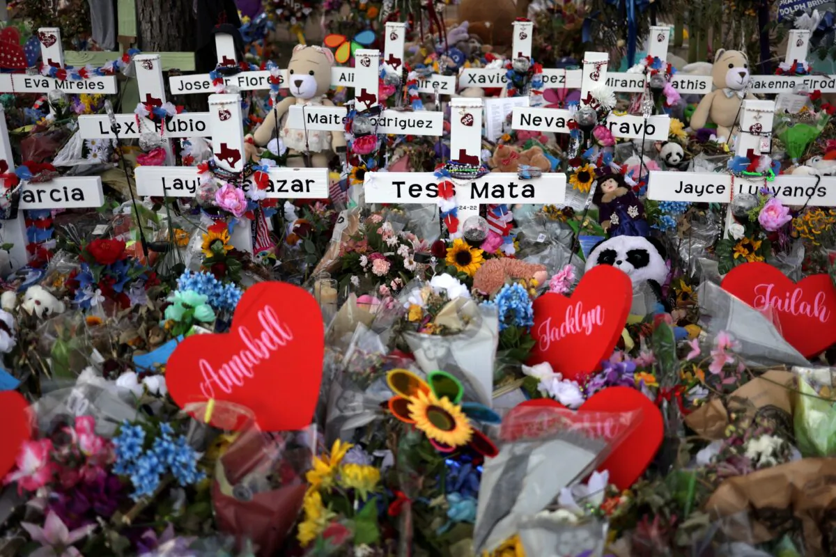 Wooden crosses are placed at a memorial dedicated to the victims of the mass shooting at Robb Elementary School in Uvalde, Texas, on June 3, 2022. (Alex Wong/Getty Images)