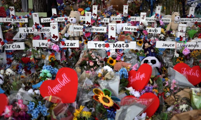 Wooden crosses are placed at a memorial dedicated to the victims of the mass shooting at Robb Elementary School in Uvalde, Texas, on June 3, 2022. (Alex Wong/Getty Images)
