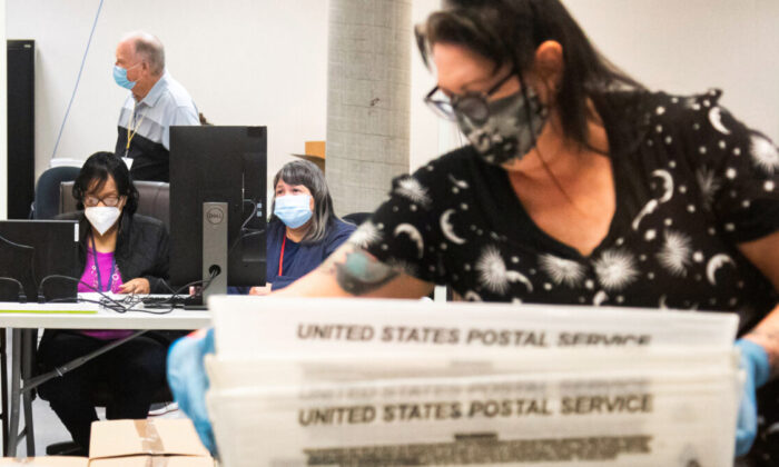 Ballots for the 2020 general election are counted by Maricopa County Elections Department staff in Phoenix on Oct. 31, 2020. (Courtney Pedroza/Getty Images)