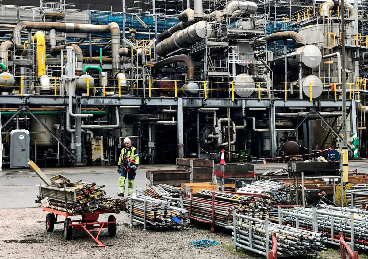 A worker walks at the Yara ammonia plant in Porsgrunn, Norway, on Aug. 9, 2017. (Lefteris Karagiannopoulos/Reuters)