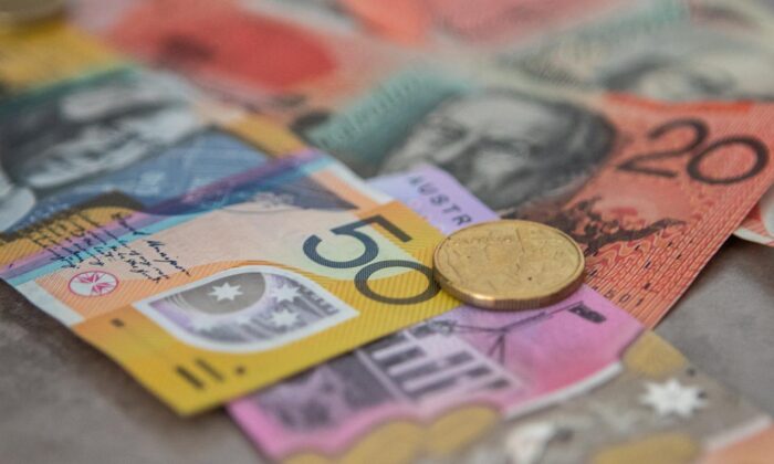 Australian banknotes and a one dollar coin. (Squirrel_photos/pixabay)