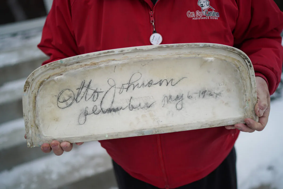 Nearly a century ago, a plumber installed a toilet in a bungalow in South Minneapolis. When the job was done, he took a pencil and signed his work on the inside of the tank lid "Otto Johnson, plumber, May 6, 1924." The homeowner used Nextdoor social media app to find descendants of Otto Johnson who might want to have the lid. (Glen Stubbe/Minneapolis Star Tribune/TNS)