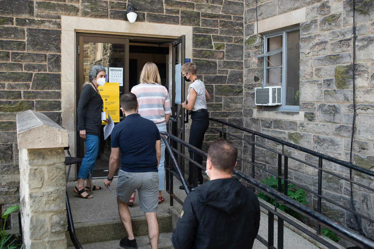 Voters arrive at a polling station in Hamilton, Ontario, on June 2, 2022. (Eduardo Lima/The Canadian Press)
