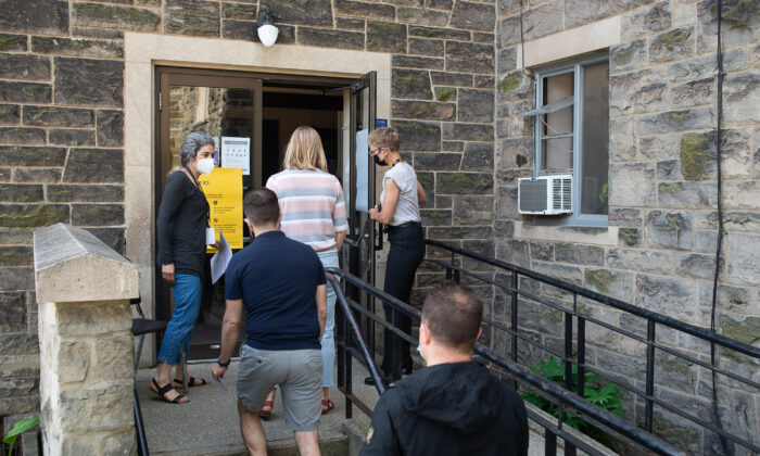 Voters arrive at a polling station in Hamilton, Ontario, on June 2, 2022. (Eduardo Lima/The Canadian Press)