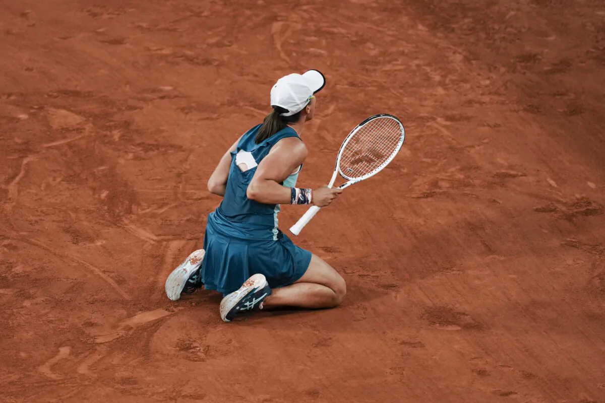 Poland's Iga Swiatek celebrates winning the final against Coco Gauff of the U.S., in two sets, 6–1, 6–3, at the French Open tennis tournament in Roland Garros stadium in Paris, on June 4, 2022. (Thibault Camus/AP Photo)