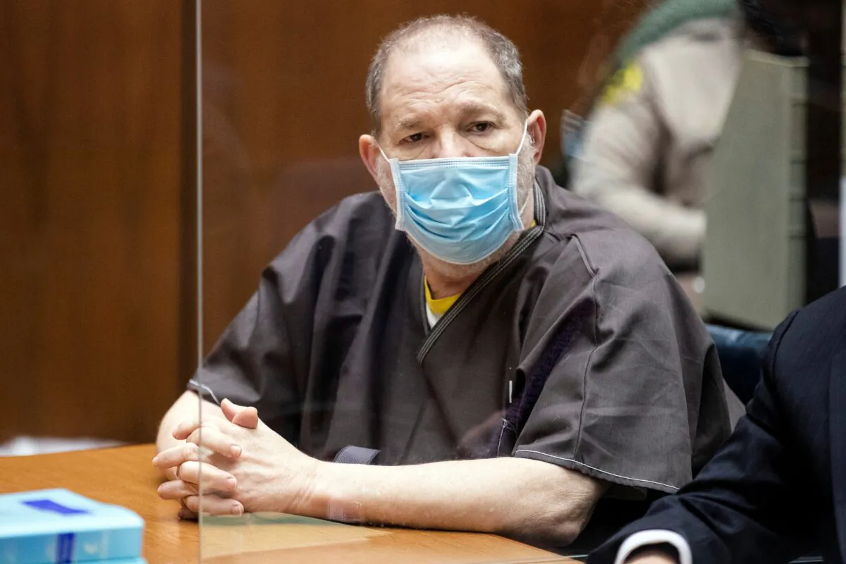 Harvey Weinstein, who was extradited from New York to Los Angeles to face sex-related charges, listens in court during a pre-trial hearing in Los Angeles on July 29, 2021. (Etienne Laurent/Pool via Reuters)