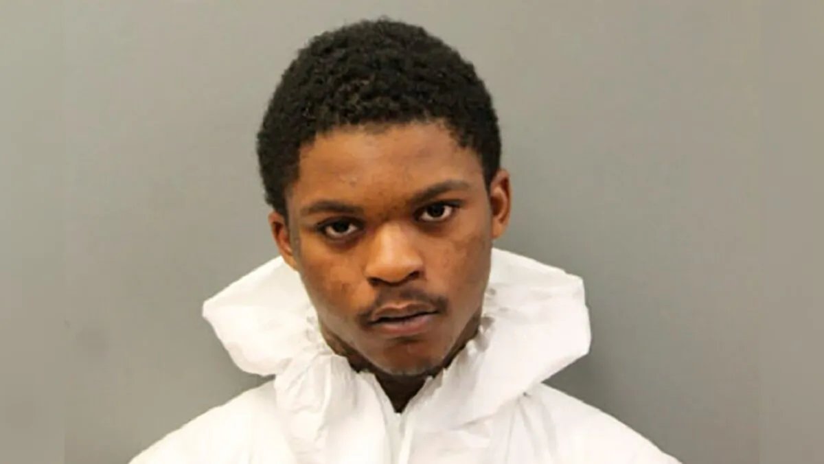 Tarrion Johnson in a booking photo. (Chicago Police Department via AP)