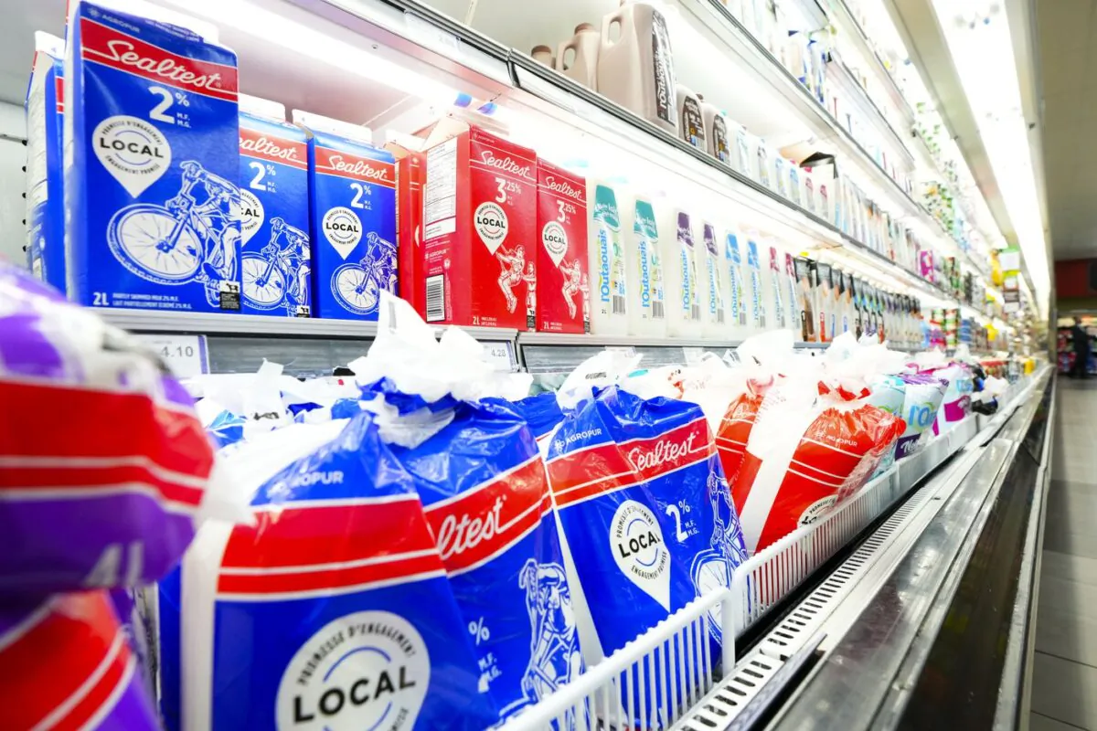 Milk and dairy products are displayed for sale at a grocery store in Aylmer, Que., on May 26, 2022. (The Canadian Press/Sean Kilpatrick)