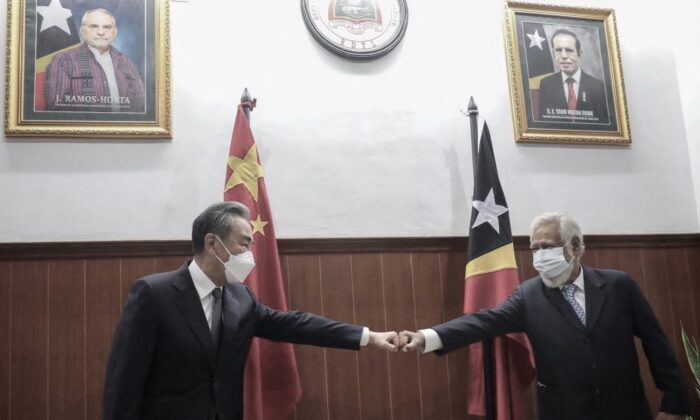 Former East Timorese leader Xanana Gusmao (R) greets Chinese Foreign Minister Wang Yi (L) during a meeting in Dili on June 4, 2022. (Valentino Dariel Sousa/ AFP) (Photo by VALENTINO DARIEL SOUSA/AFP via Getty Images)