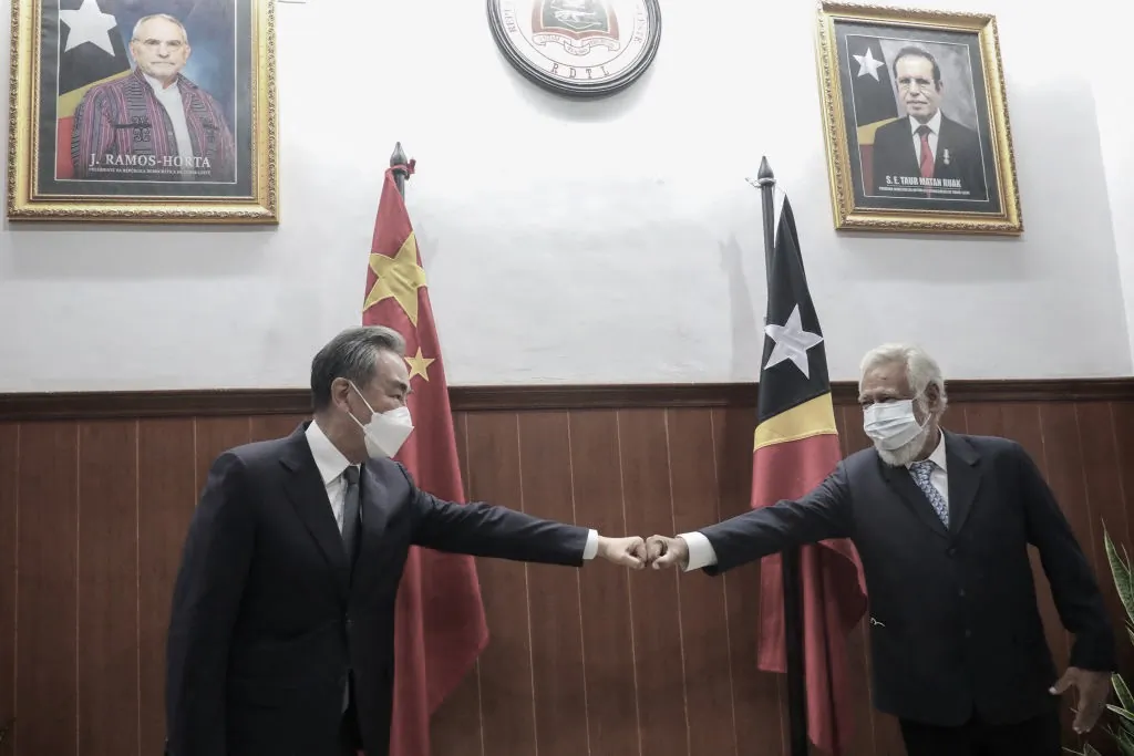 Former East Timorese leader Xanana Gusmao (R) greets Chinese Foreign Minister Wang Yi (L) during a meeting in Dili on June 4, 2022. (Valentino Dariel Sousa/ AFP) (Photo by VALENTINO DARIEL SOUSA/AFP via Getty Images)