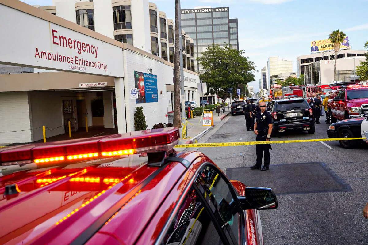 Police and emergency personnel stand outside Encino Hospital Medical Center in Los Angeles on June 3, 2022. (Damian Dovarganes/AP Photo)