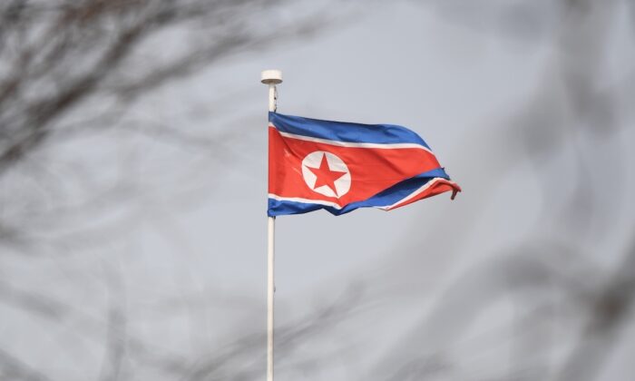 The North Korean flag flies above the North Korean embassy in Beijing on March 9, 2018. (Greg Baker/AFP via Getty Images)