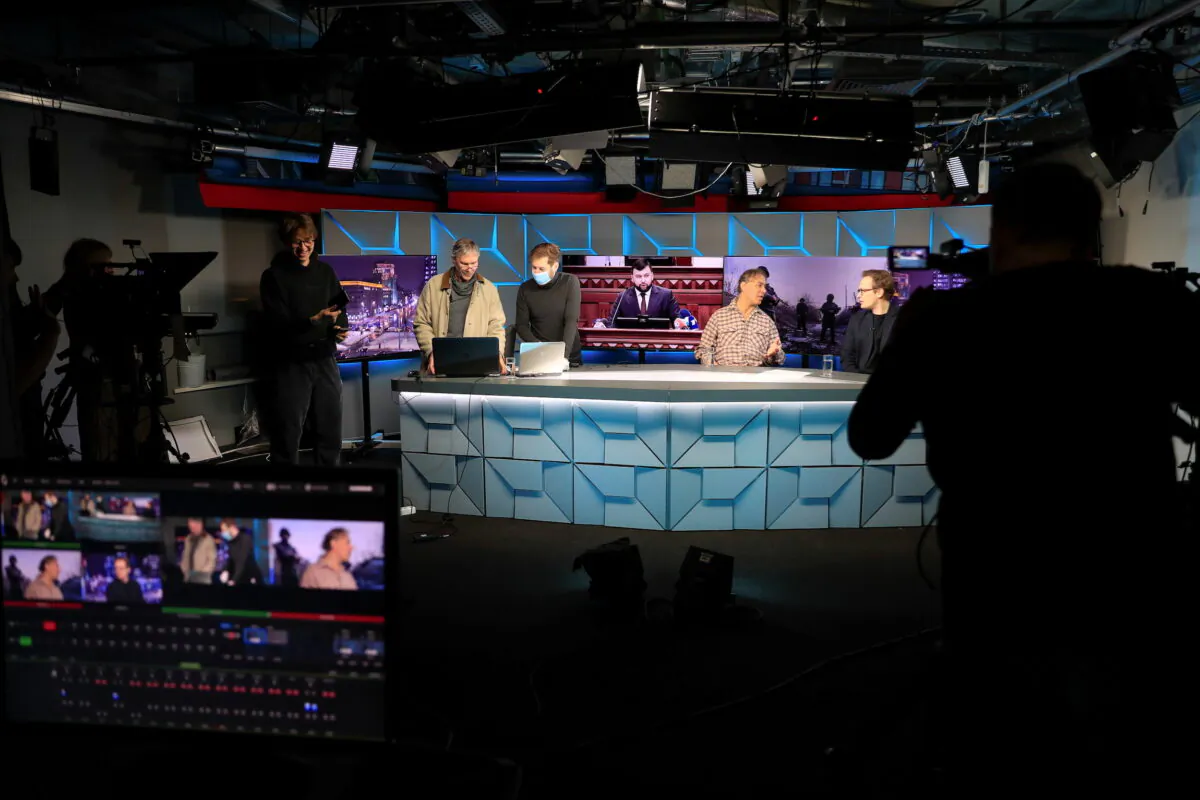Journalists work in the studio of Radio Free Europe/Radio Liberty (RFE/RL) broadcaster in Moscow on April 6, 2021. (Evgenia Novozhenina/Reuters)