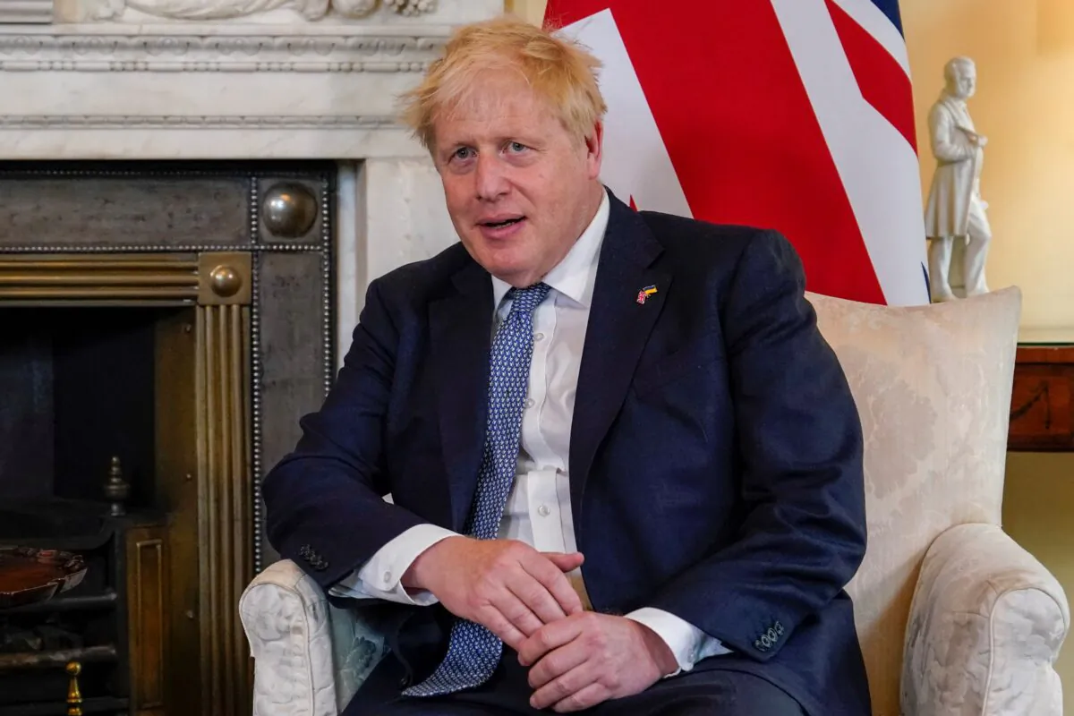 Britain's Prime Minister Boris Johnson reacts as he meets with Estonia's Prime Minister Kaja Kallas inside 10 Downing Street on June 6, 2022. (Alberto Pezzali/Pool/AFP via Getty Images)