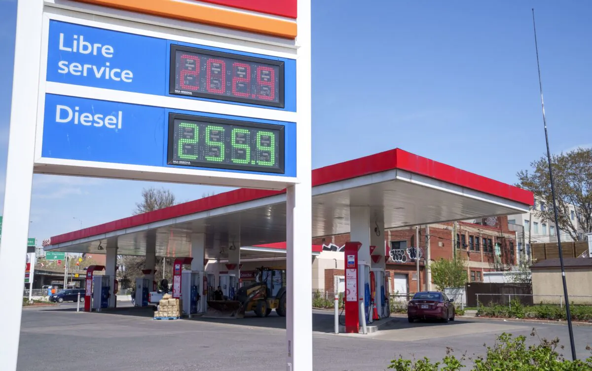The prices of regular gasoline and diesel fuel are displayed at a gas station in Montreal on May 11, 2022. (The Canadian Press/Paul Chiasson)