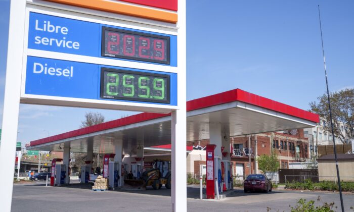 The prices of regular gasoline and diesel fuel are displayed at a gas station in Montreal on May 11, 2022. (The Canadian Press/Paul Chiasson)