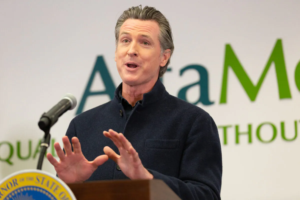 Governor Gavin Newsom speaks to reporters at AltaMed Urgent Care in Santa Ana, Calif., on March 25, 2021. (John Fredricks/The Epoch Times)