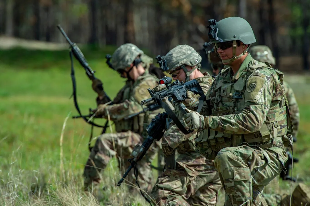Members of the 182nd Infantry Regiment at a live fire weapons training at U.S. Fort Dix in New Jersey on May 16, 2022. (Joseph Prezioso/AFP via Getty Images)
