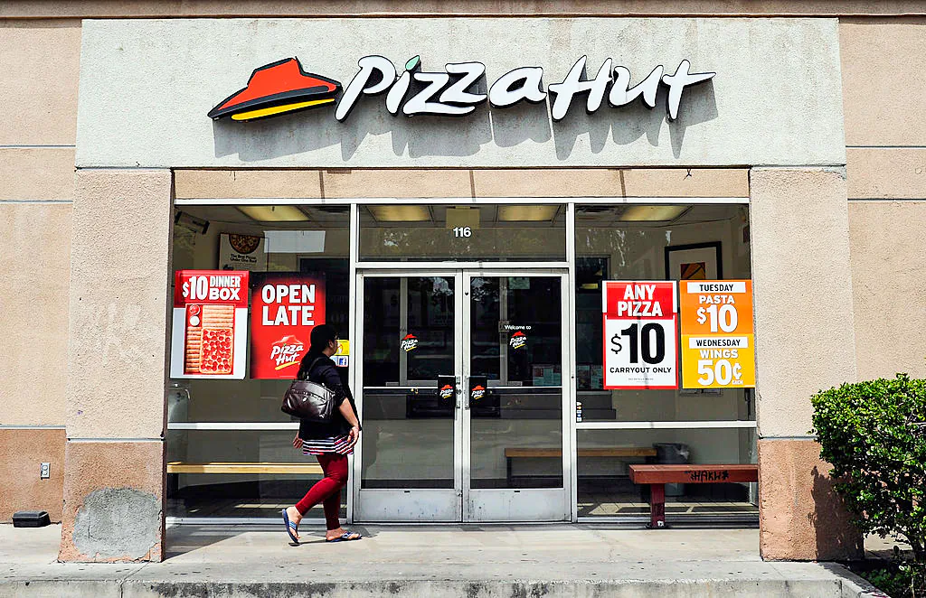 A customer walks in to a Pizza Hut restaurant. (Kevork Djansezian/Getty Images)