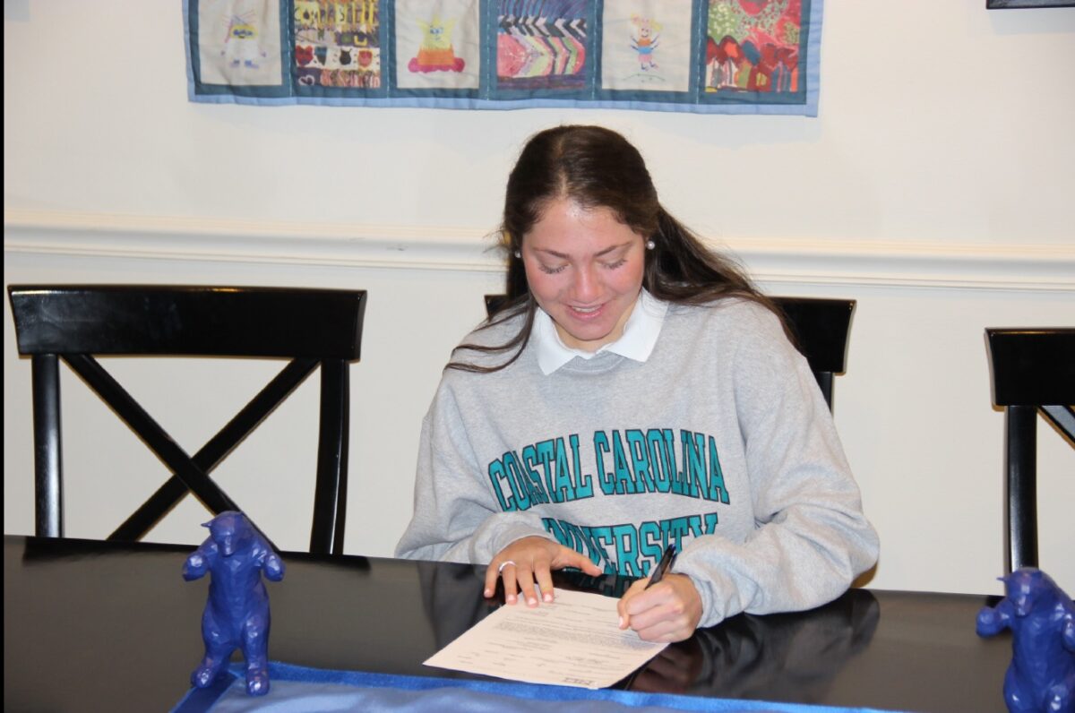 Brooke Gottlieb signing her National Letter of Intent to play at Coastal Carolina University. (Courtesy of her father, Richard Gottlieb)