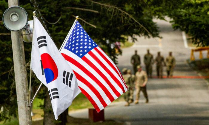 The South Korean and American flags fly next to each other at Yongin, South Korea, on Aug. 23, 2016. (Courtesy of Ken Scar/U.S. Army/Handout via Reuters)