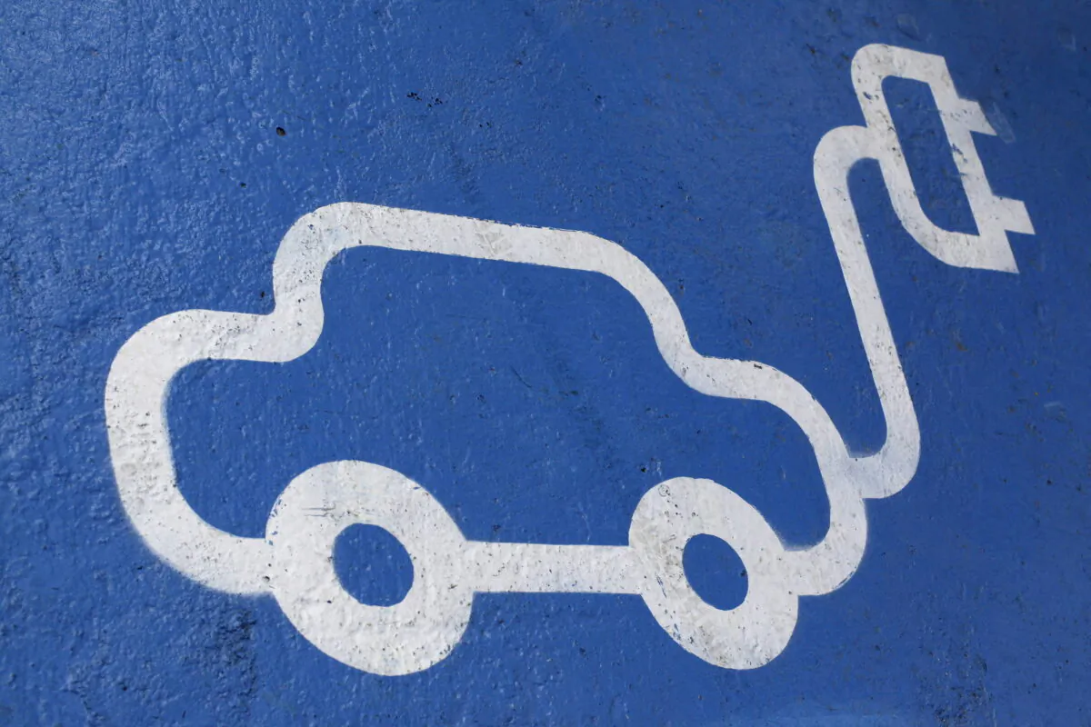 The logo of an electric car painted on the road at Santiago, Chile, on April 20, 2011. (Ivan Alvarado/Reuters)