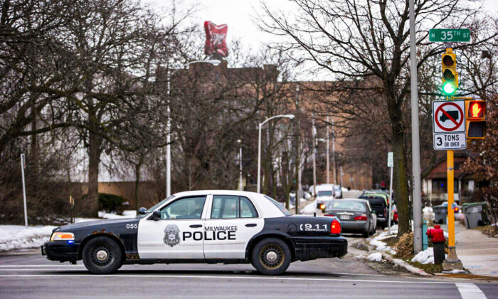 A police car blocks a road at the scene of a shooting in Wisconsin on Feb. 26, 2020. (Nuccio DiNuzzo/Getty Images)