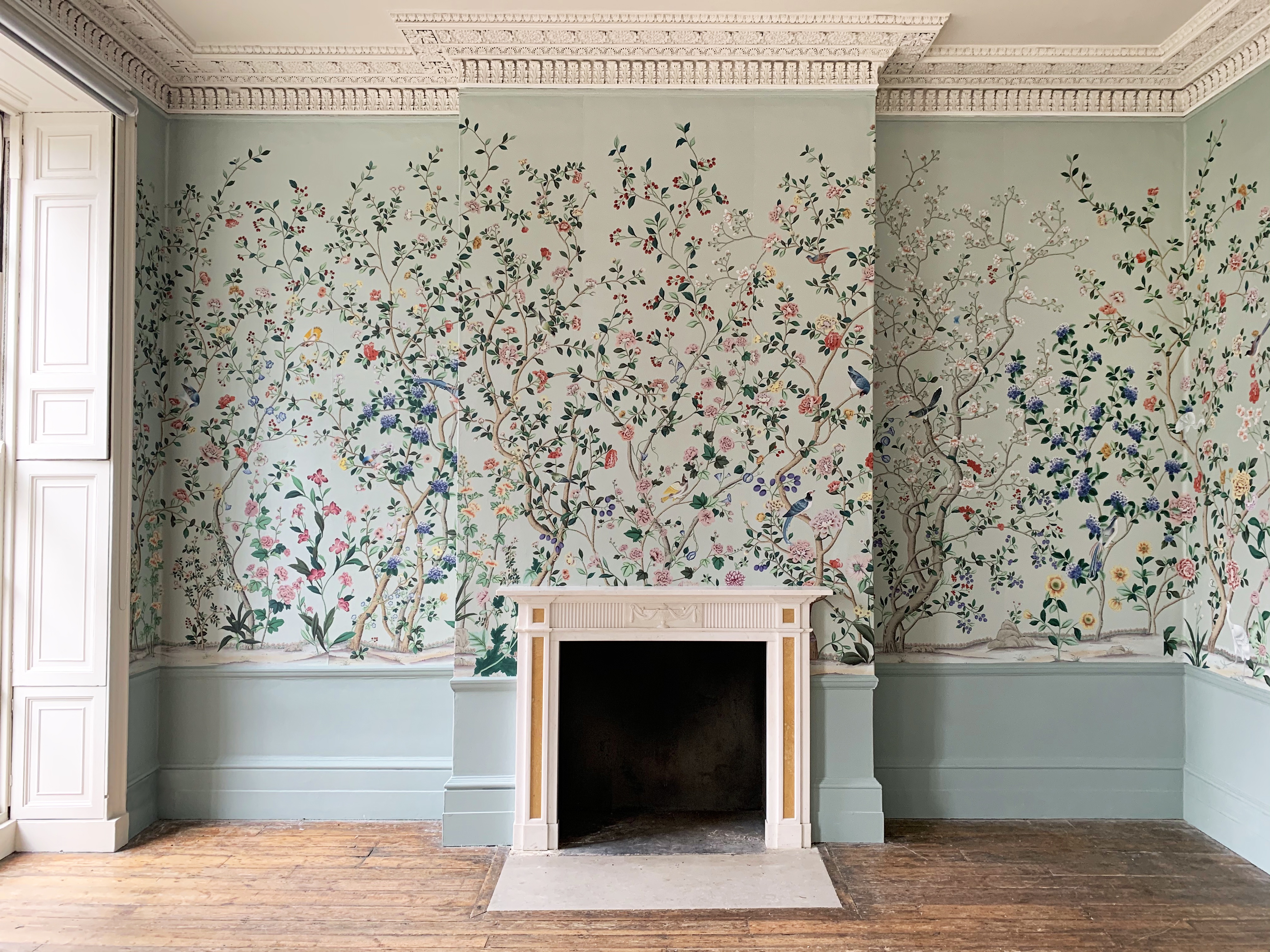 "Erdem" on Adam Grey dyed silk, a collaboration between de Gournay and fashion designer Erdem Moralioglu. The capsule collection depicts sparrows, warblers, pheasants, and egrets among hydrangeas, hollyhocks, irises, chrysanthemums, and morning glories.