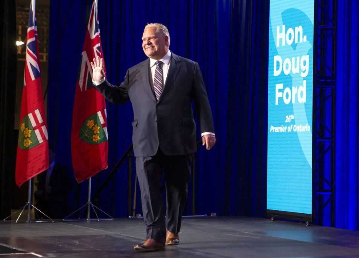 Ontario Premier Doug Ford waves as he arrives for a news conference in Toronto on June 3, 2022, after winning the provincial election. (The Canadian Press/Chris Young)