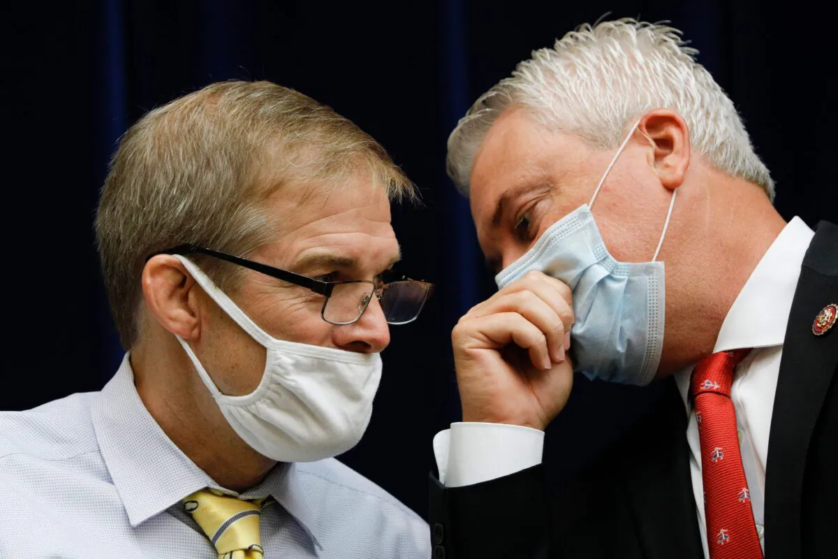 Rep. Jim Jordan (R-Ohio) speaks to Rep. James Comer (R-Ky.) during a House Oversight and Reform Committee hearing on slowdowns at the Postal Service ahead of the November elections on Capitol Hill in Washington, on Aug. 24, 2020. (Tom Brenner/POOL/AFP via Getty Images)