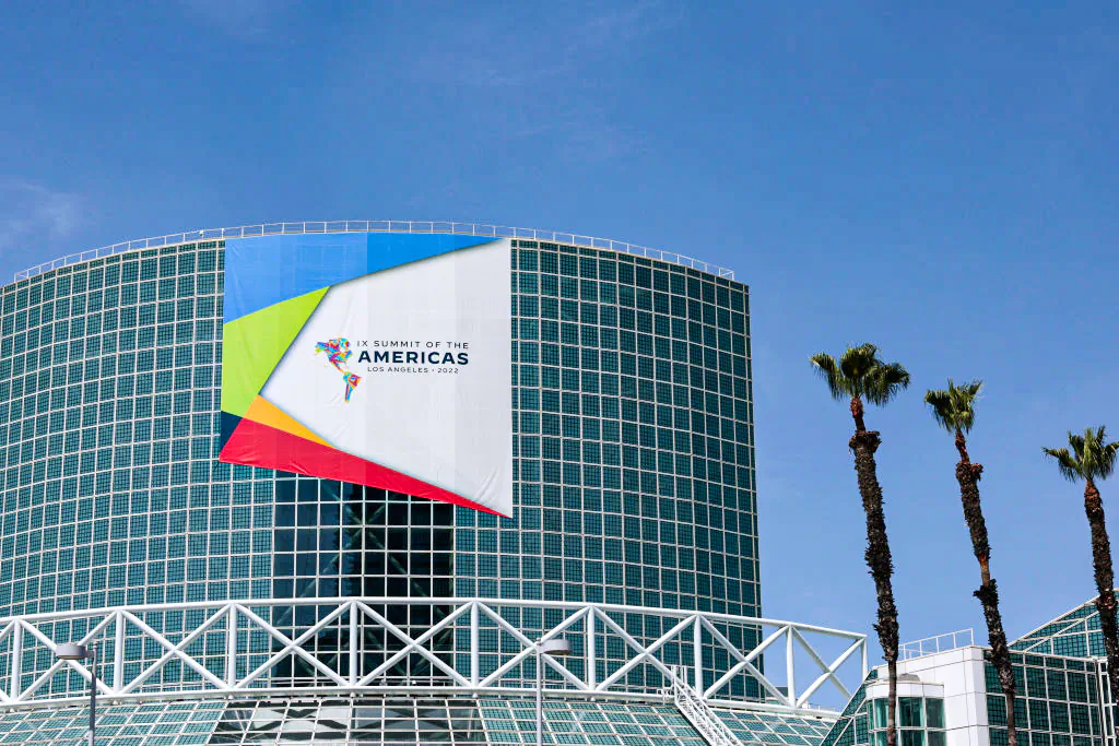 A banner hangs on the Los Angeles Convention Center, the location for the Ninth Summit of the Americas in Los Angeles on June 5, 2022. (Anna Moneymaker/Getty Images)