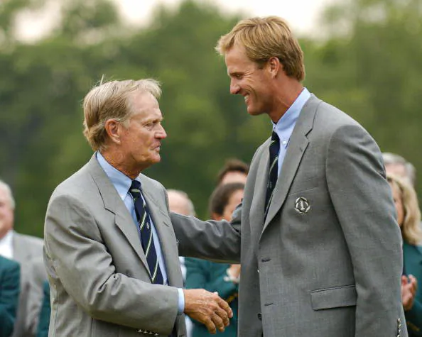 Jack Nicklaus talks with his son, Jack II, before  the award presentations after   final-round  play in The Memorial Tournament, June 6, 2004 in Dublin, Ohio. (A. Messerschmidt/Getty Images)