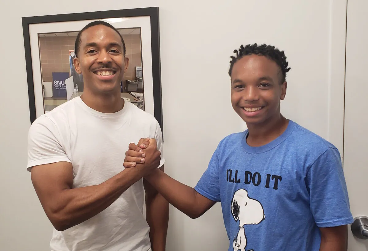 A mentoring match, Mark B. and Tysaun, 14. (Courtesy of Big Brothers Big Sisters)
