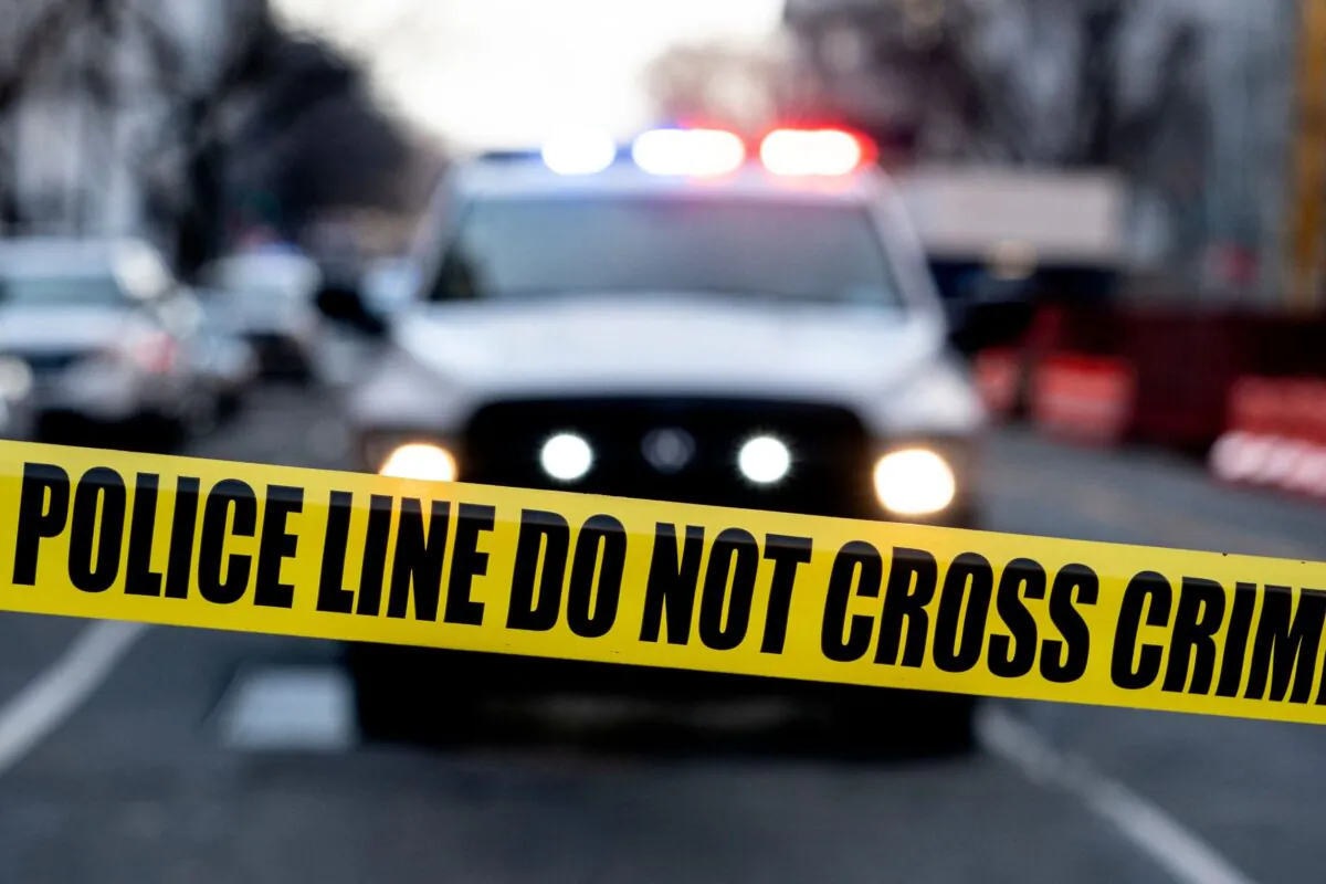 Police tape in a file photo. (Stefani Reynolds/AFP via Getty Images)