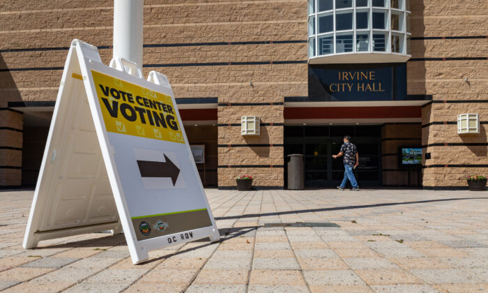 Voters turn in their ballots at Irvine City Hall in Irvine, Calif., on June 7, 2022. (John Fredricks/The Epoch Times)