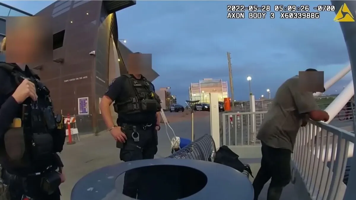 Police bodycam footage shows the police officers talking to Sean Bickings before he gets into Tempe Town Lake in Tempe, Ariz., on May 28, 2022. (City of Tempe)