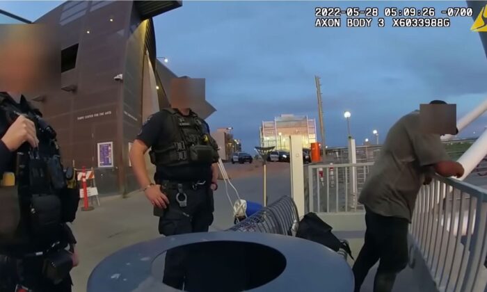 Police bodycam footage shows the police officers talking to Sean Bickings before he gets into Tempe Town Lake in Tempe, Ariz., on May 28, 2022. (City of Tempe)