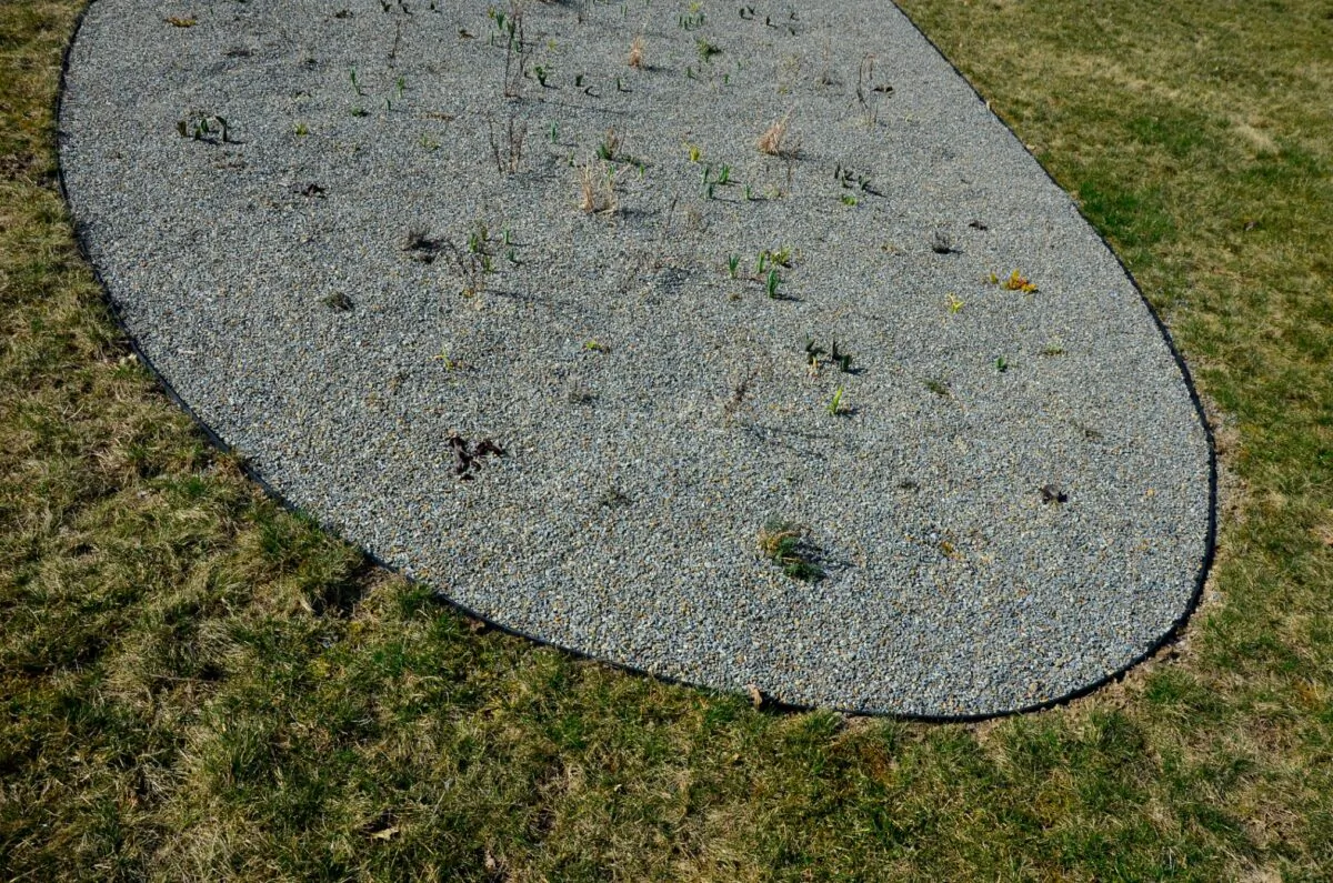 Edging defines garden beds and prevents plants from creeping and spreading. 
 (Dreamstime/TNS)