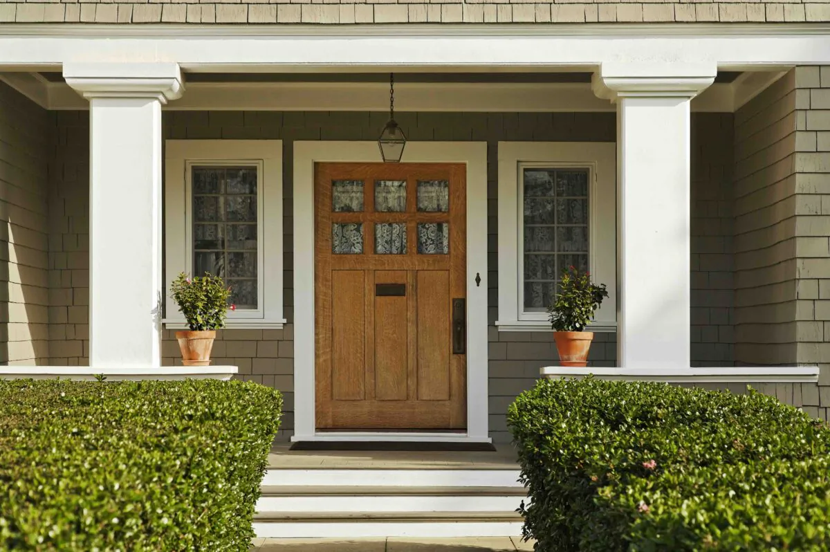 Before you begin any planting between your property and your neighbors’ property, consult your survey. (David Papazian/Shutterstock)