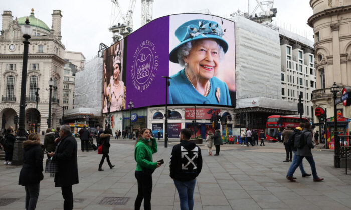 A portrait of Queen Elizabeth II is displayed on the large screen at Piccadilly Circus to mark the start of the Platinum Jubilee in London, England, on Feb. 6, 2022. (Hollie Adams/Getty Images)