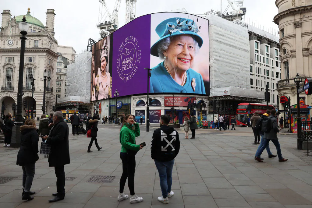 A portrait of Queen Elizabeth II is displayed on the large screen at Piccadilly Circus to mark the start of the Platinum Jubilee in London, England, on Feb. 6, 2022. (Hollie Adams/Getty Images)