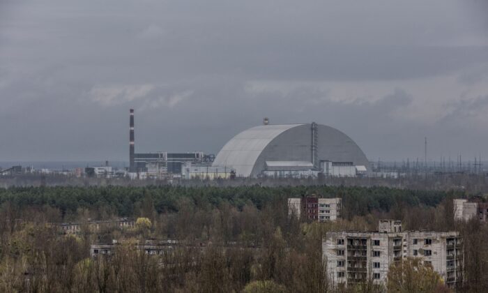 An overview of the new Safe Confinement (NSC) structure on an old sarcophagus covering a damaged fourth reactor at the Chernobyl nuclear power plant in Chernobyl, Ukraine, April 26, 2022.  (Oleksandr Ratushniak / Reuters)